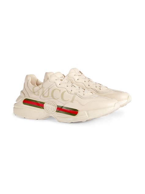 gucci rhyton fake logo|gucci rhyton distressed sneakers.